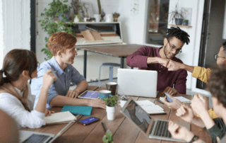 A group of people having a team meeting.