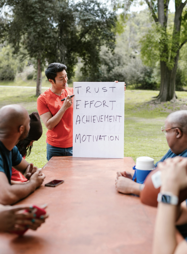 Man Speaking To A Group On Team Building