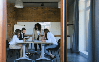 A manager managing a group of office workers.