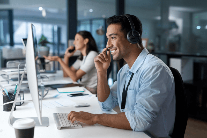 A man listening to a call. 